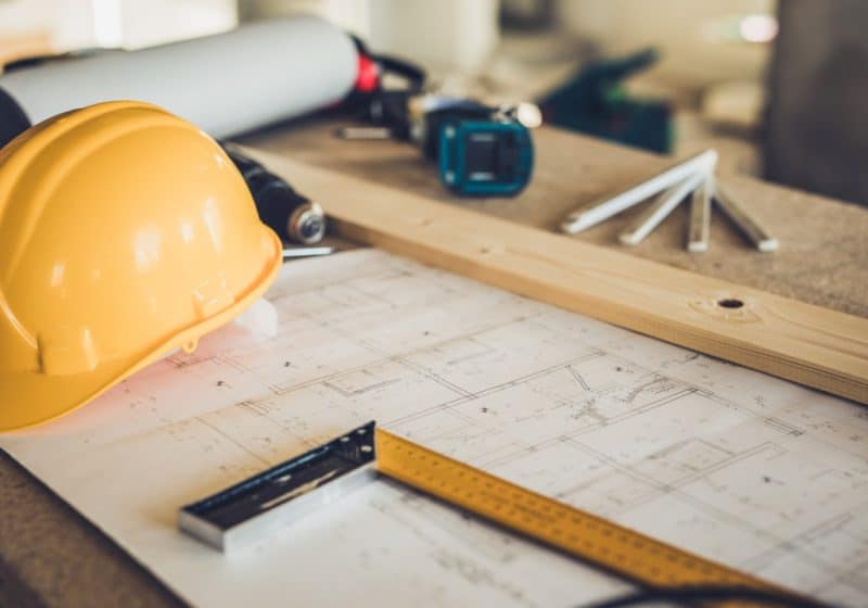 blueprints and construction equipment